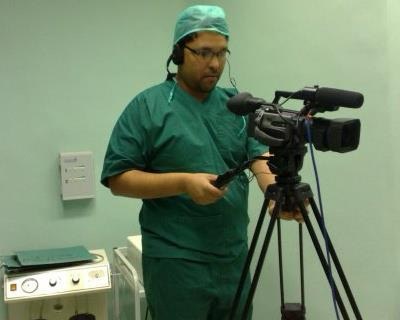 Hossam Nageeb filming with a camera