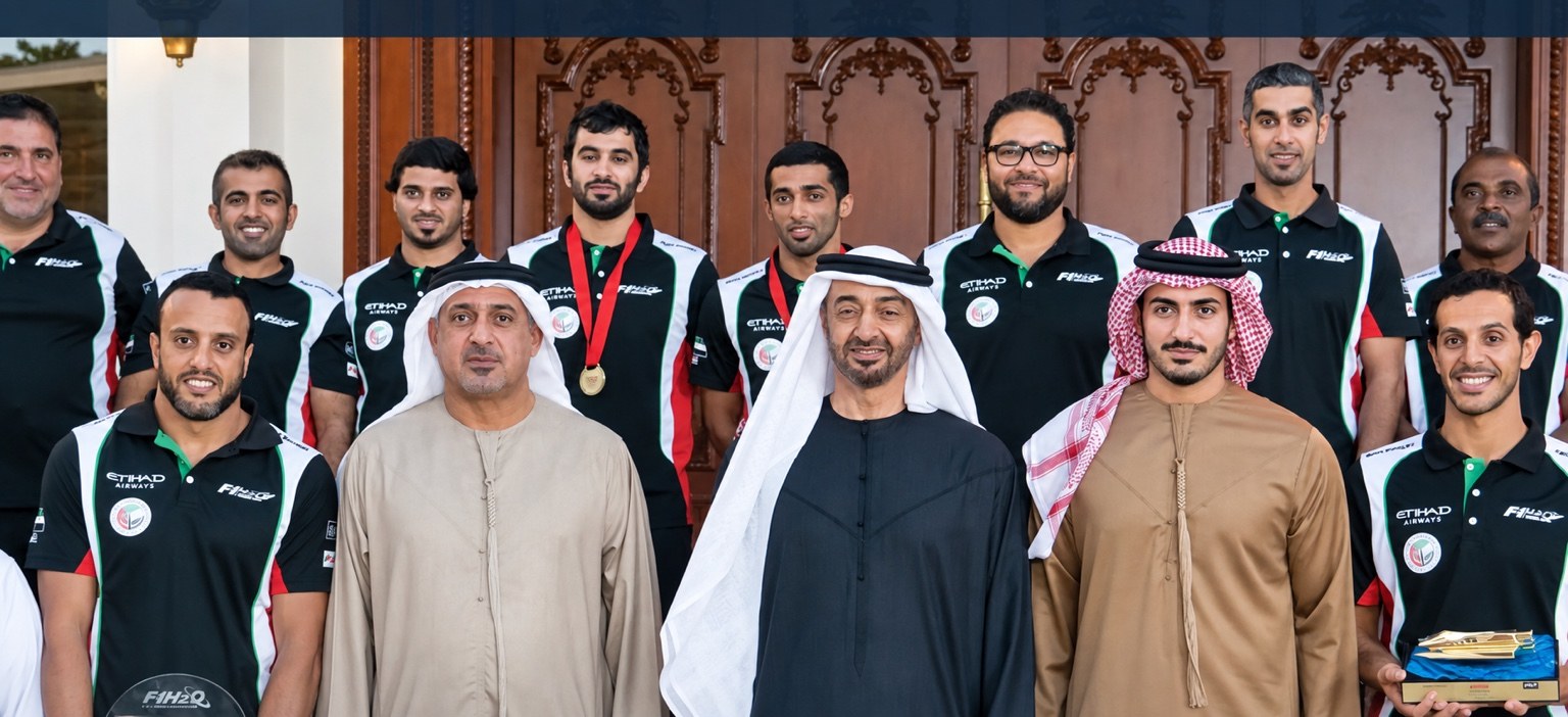 حسام نجيب with فريق أبوظبي at an official reception