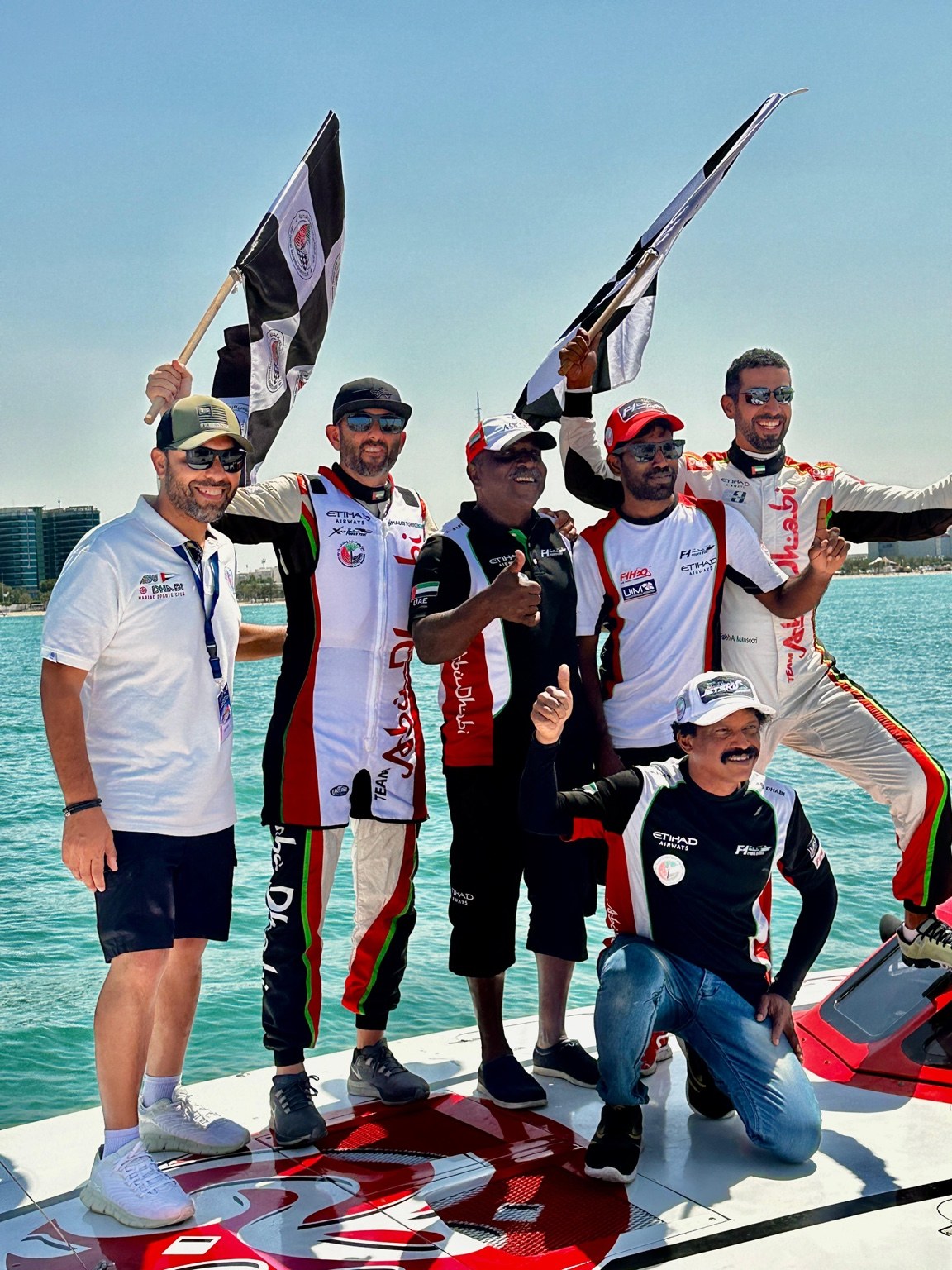 حسام نجيب with فريق أبوظبي on the water